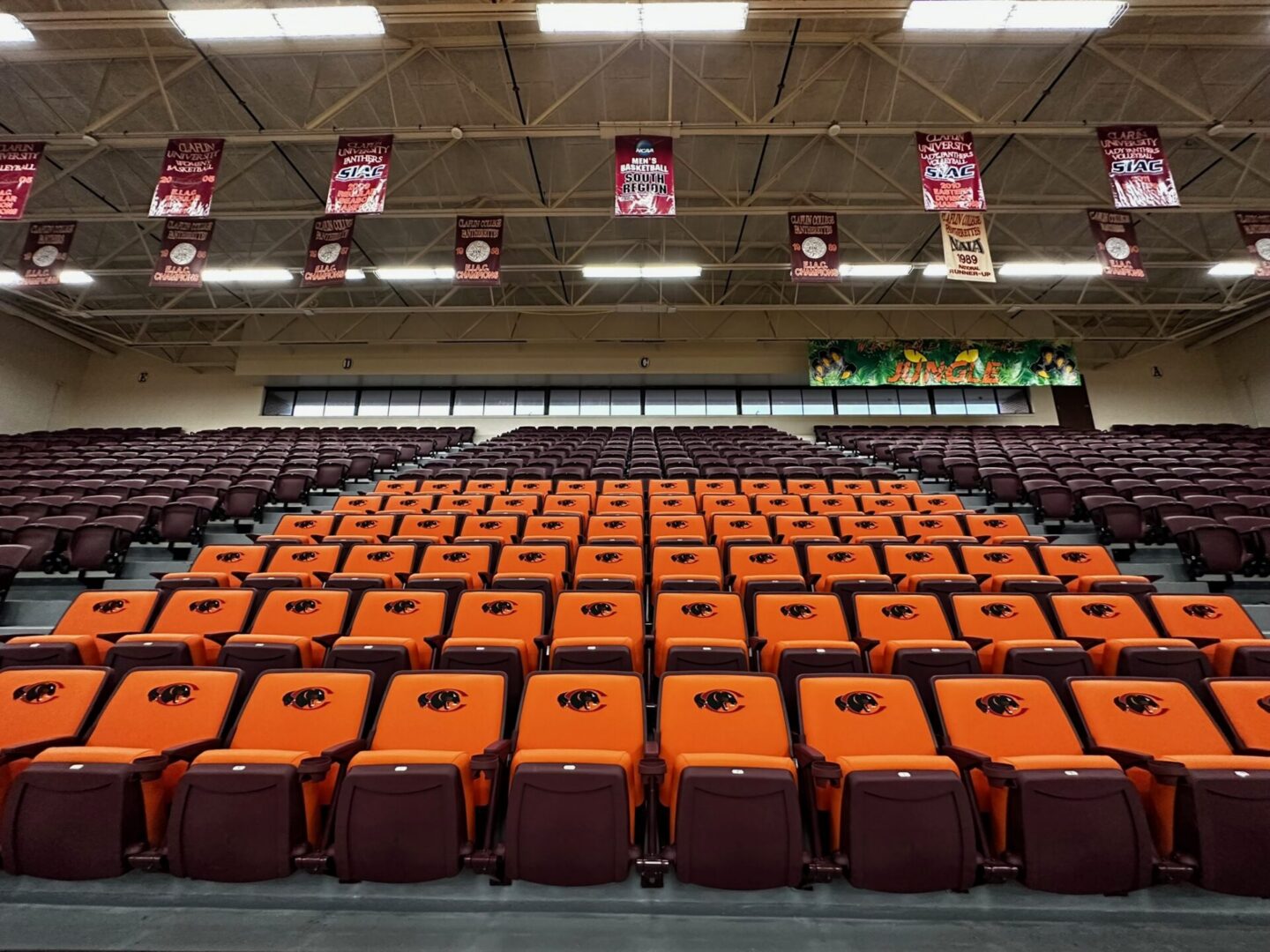 Stadium bleachers with red and black decor