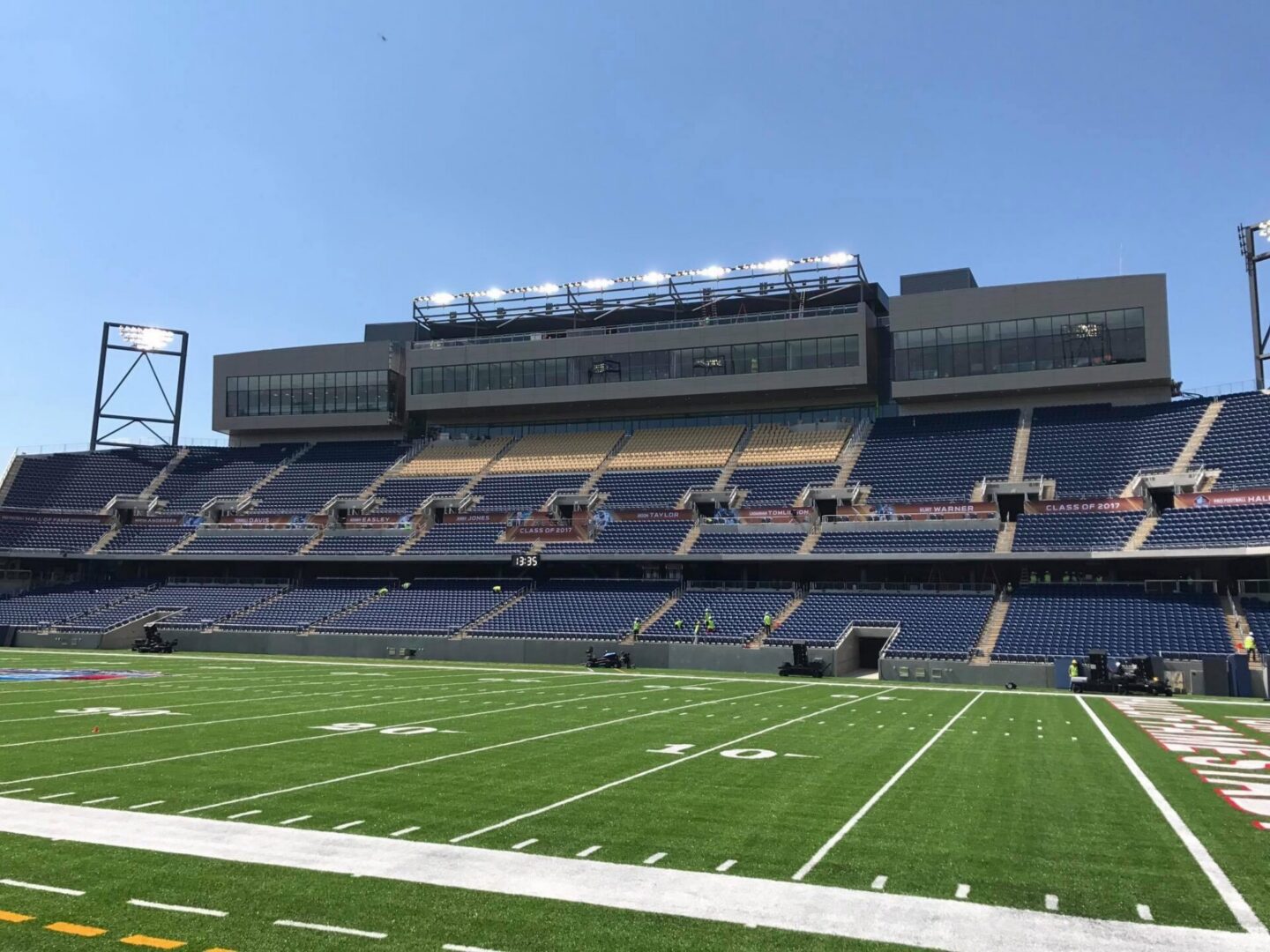 Large stadium seating under clear sky